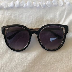 Black and gold Guess sunglasses